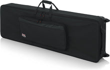 Load image into Gallery viewer, Gator Cases GK-76 Lightweight Keyboard Case with Pull Handle and Wheels; Fits 76-Note Keyboards