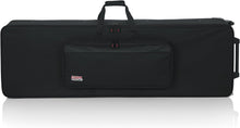 Load image into Gallery viewer, Gator Cases GK-76 Lightweight Keyboard Case with Pull Handle and Wheels; Fits 76-Note Keyboards