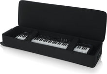 Load image into Gallery viewer, Gator Cases GK-76 Lightweight Keyboard Case with Pull Handle and Wheels; Fits 76-Note Keyboards