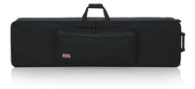 Load image into Gallery viewer, Gator Cases GK-88 SLXL Rigid Lightweight Case w/ Wheels for Slim, Extra long 88-Note Keyboards