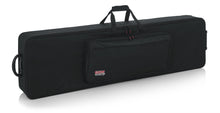 Load image into Gallery viewer, Gator Cases GK-88 SLXL Rigid Lightweight Case w/ Wheels for Slim, Extra long 88-Note Keyboards
