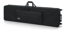 Load image into Gallery viewer, Gator Cases GK-88 SLXL Rigid Lightweight Case w/ Wheels for Slim, Extra long 88-Note Keyboards