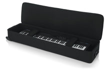 Load image into Gallery viewer, Gator Cases GK-88 SLXL Rigid Lightweight Case w/ Wheels for Slim, Extra long 88-Note Keyboards