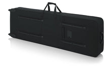 Load image into Gallery viewer, Gator Cases GK-88 XL Rigid Lightweight Case w/ Wheels for Extra Long 88-Note Keyboards