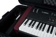 Load image into Gallery viewer, Gator Cases GTSA-KEY88 TSA ATA Molded 88-note Keyboard Case w/ Wheels