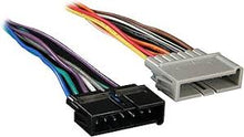 Load image into Gallery viewer, Metra 99-6503 Single-DIN Multi Kit Compatible Fits Chrysler 1998-2010 + Harness